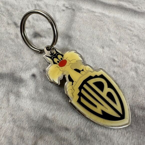 VTG 1999 Sylvester Cat Warner Bros Logo Keychain Looney Tunes - Picture 1 of 3